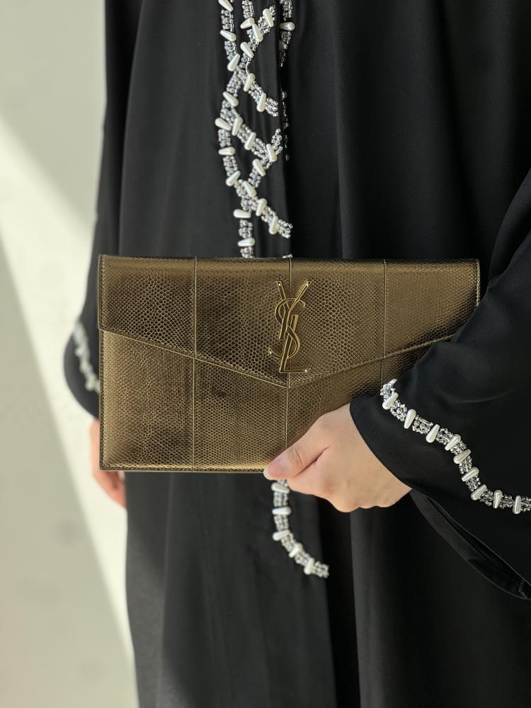 سان لوران | UPTOWN POUCH IN LEATHER