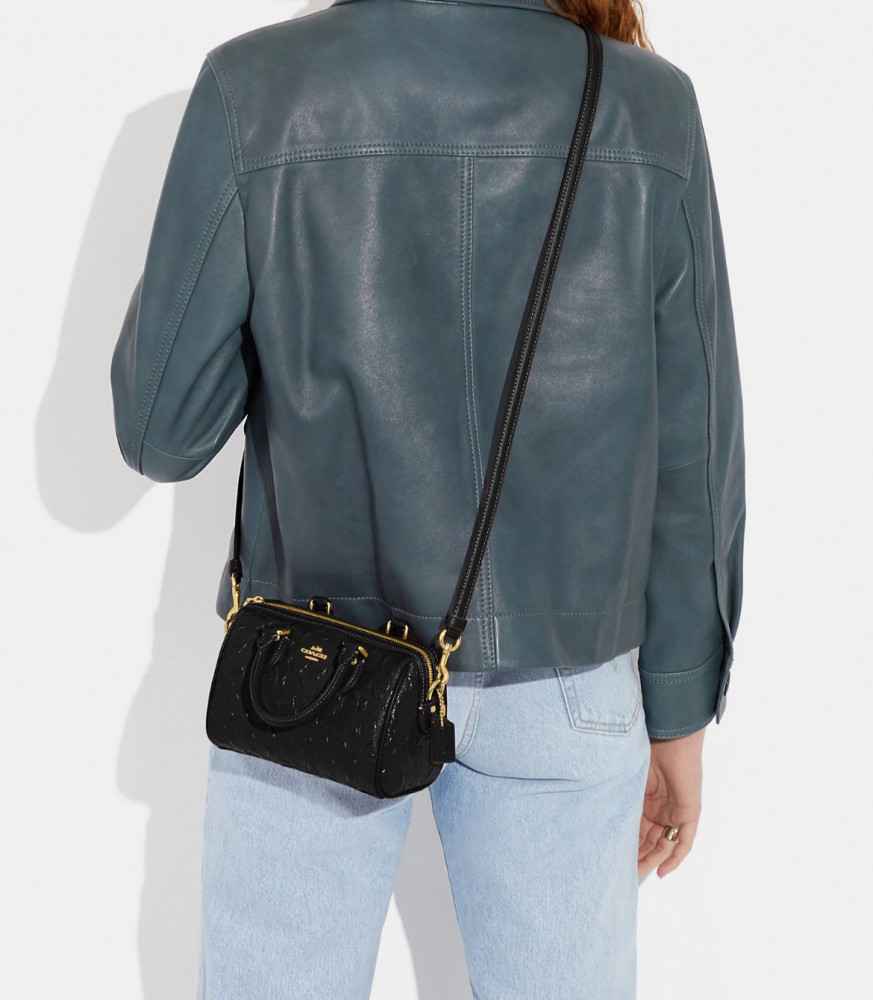 كوتش | Mini Rowan Crossbody in signature canvas