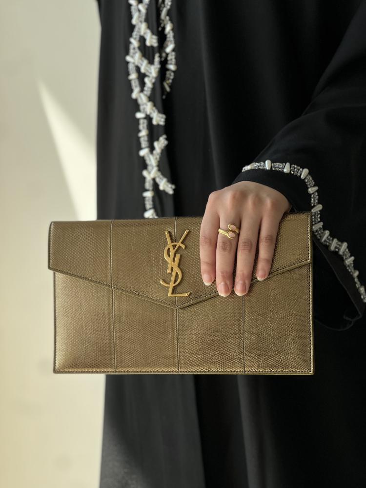 سان لوران | UPTOWN POUCH IN LEATHER
