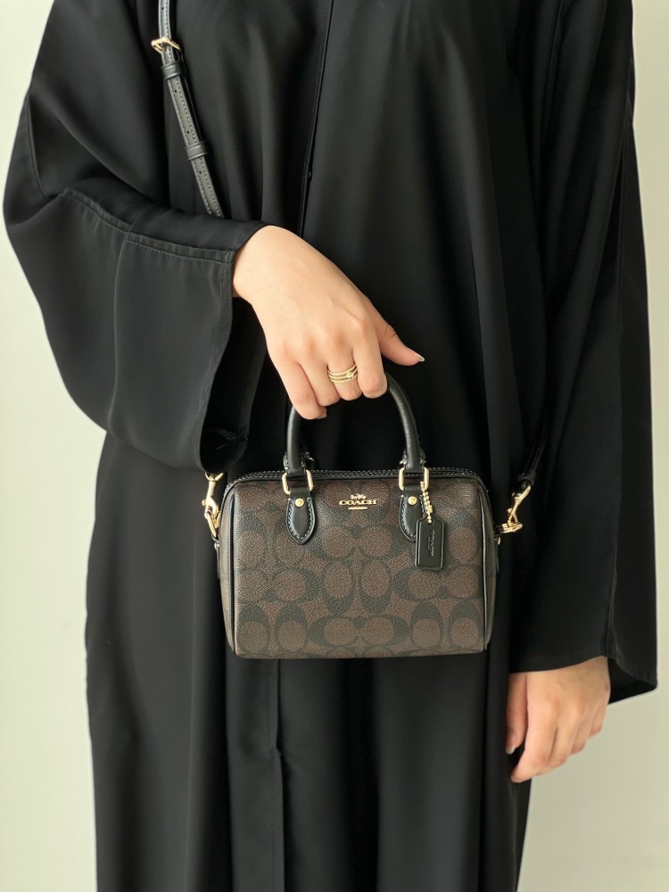 كوتش | Mini Rowan Crossbody in signature canvas