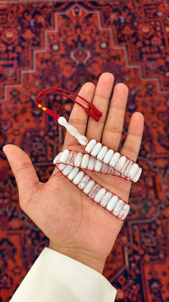 يوناني - ابيض مموج بخيط عودي