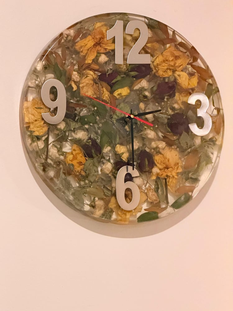 A clock made of natural dried flowers, diameter 35 cm