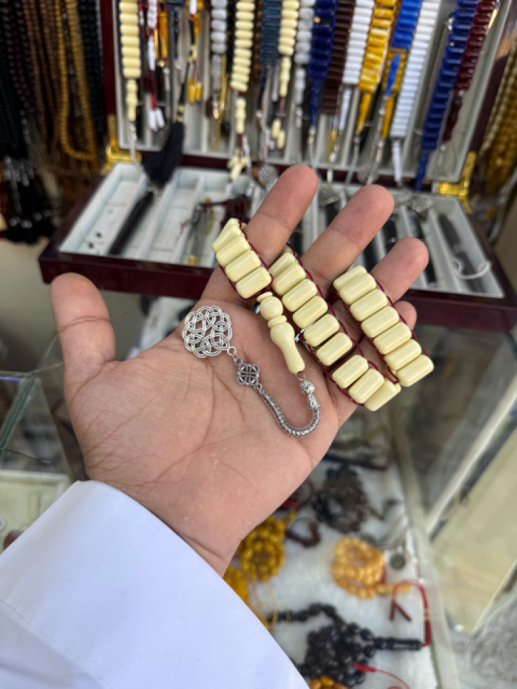 Beige color prayer beads