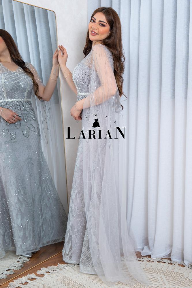 Evening dress with long sleeves, a mix of patterns and rhinestones
