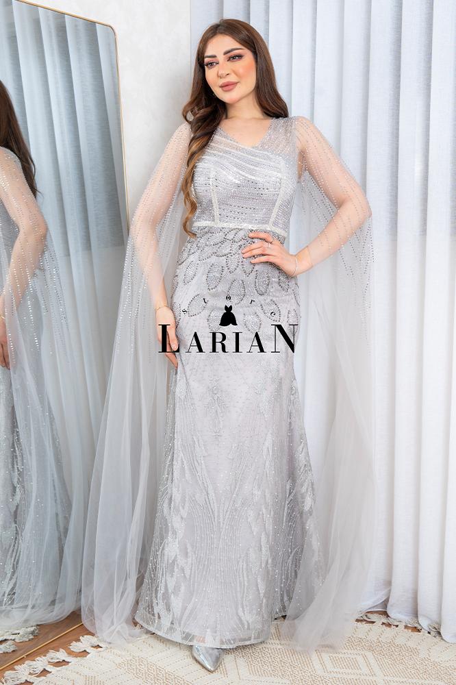 Evening dress with long sleeves, a mix of patterns and rhinestones