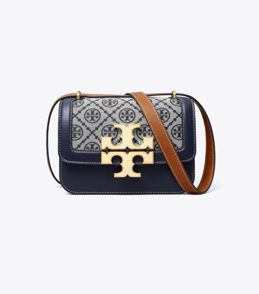 حقيبة كتف نسائية كحلي بنقشة كلاسيكية وإبزيم ذهبي فاخر من Tory Burch