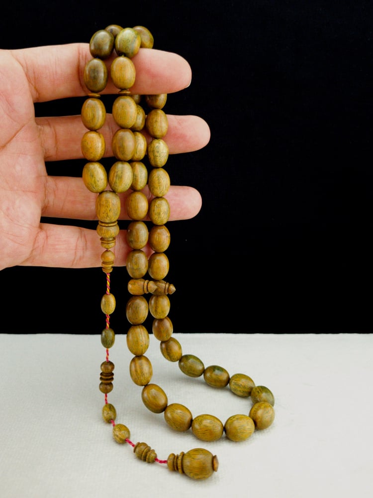 مسباح من خشب البلسنك الطبيعي