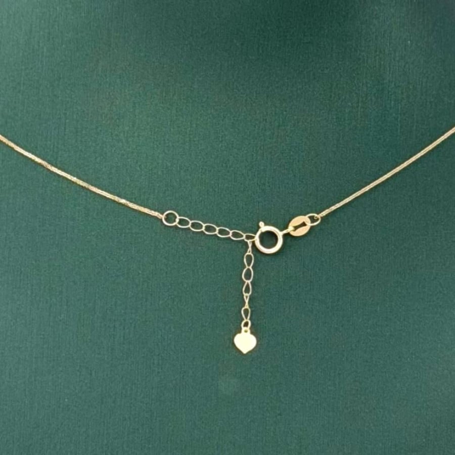 سلسال ذهب اصفر عيار 18 من مجوهرات الشلوي