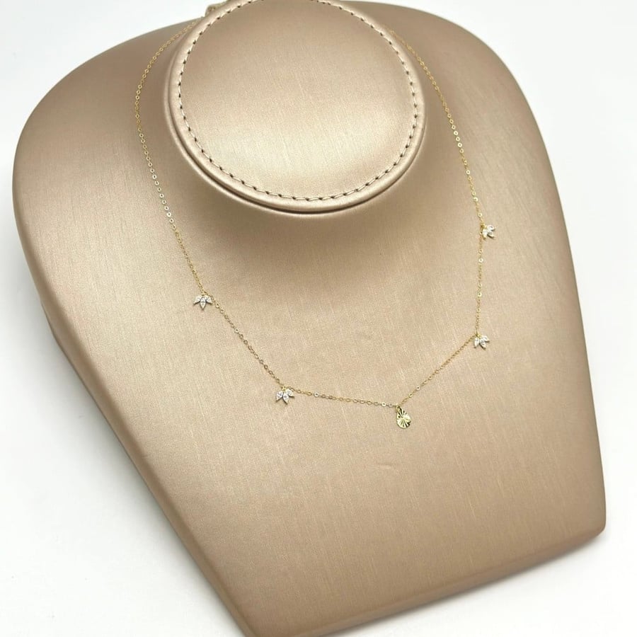 عقد ذهب أصفر عيار18 من مجوهرات الشلوي -18 K yellow gold necklace from