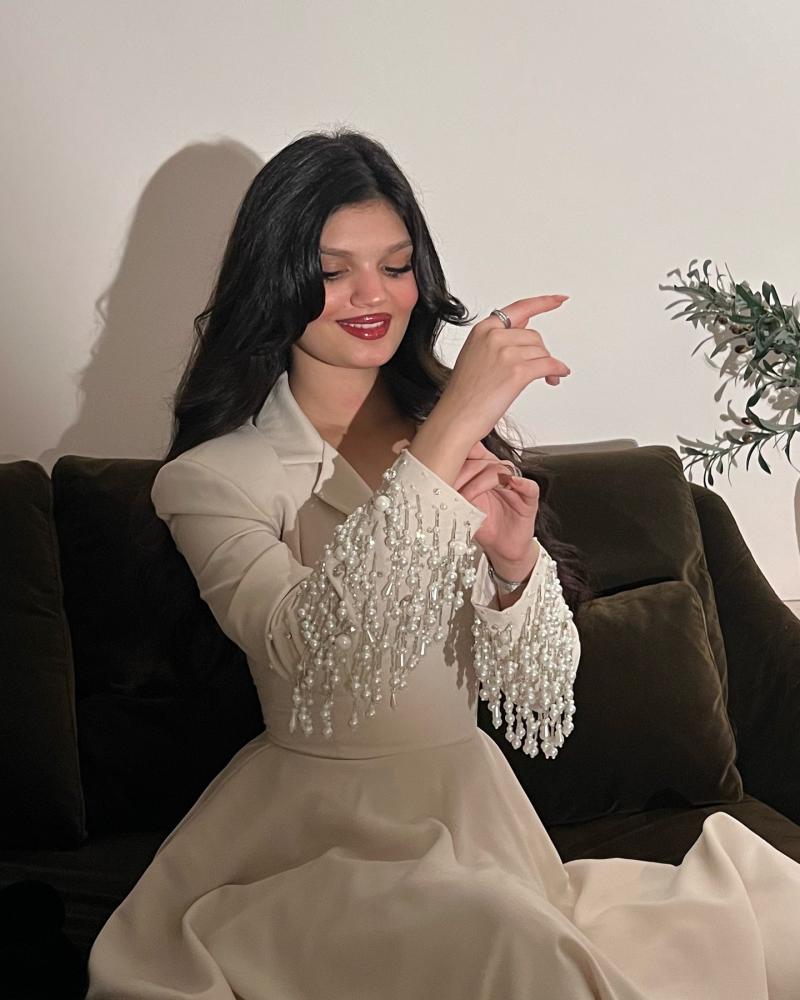 فستان بيج بتطريز على الاكمام