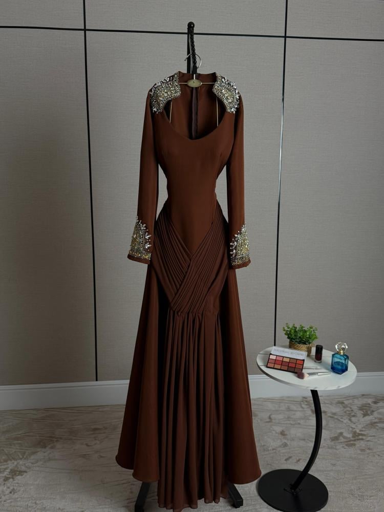 Elegant brown evening dress embroidered with gold