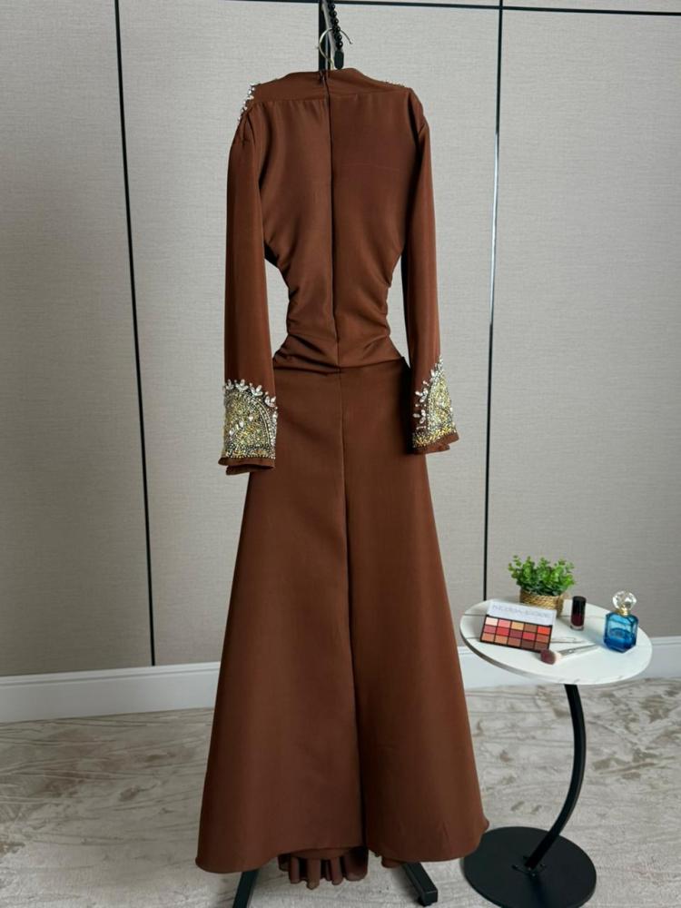 Elegant brown evening dress embroidered with gold