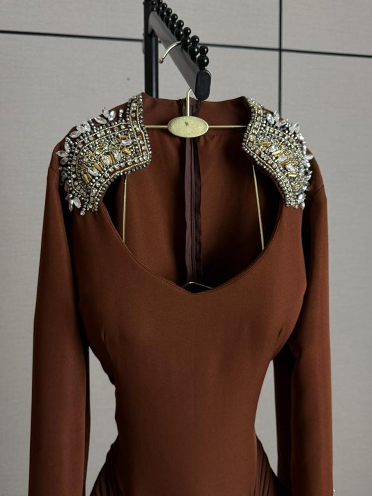 Elegant brown evening dress embroidered with gold