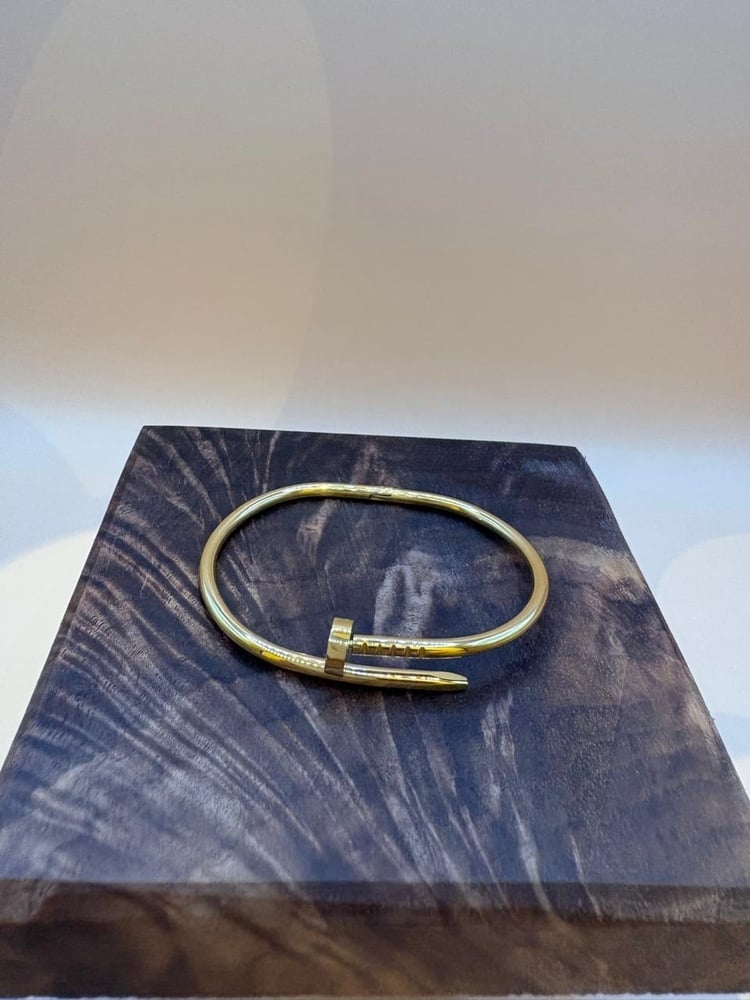 Cartier thin nail bracelet in gold