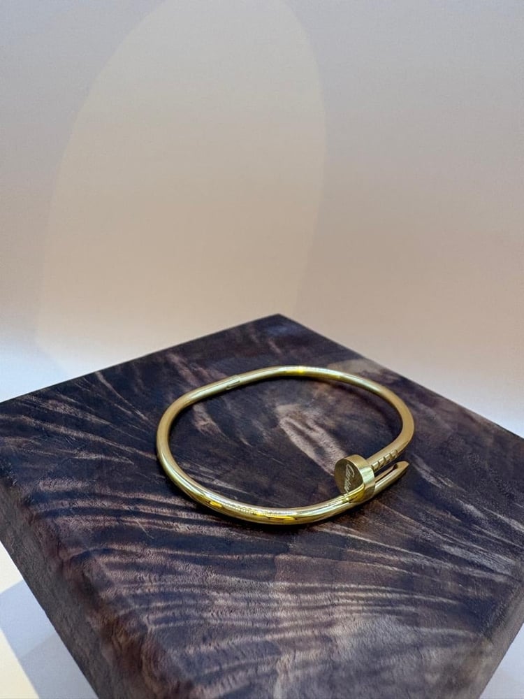 Cartier thin nail bracelet in gold