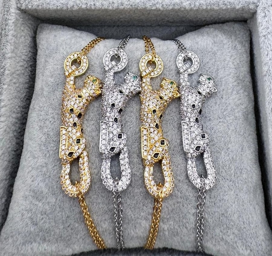 Cartier brand bracelets in gold and silver with zircon stones