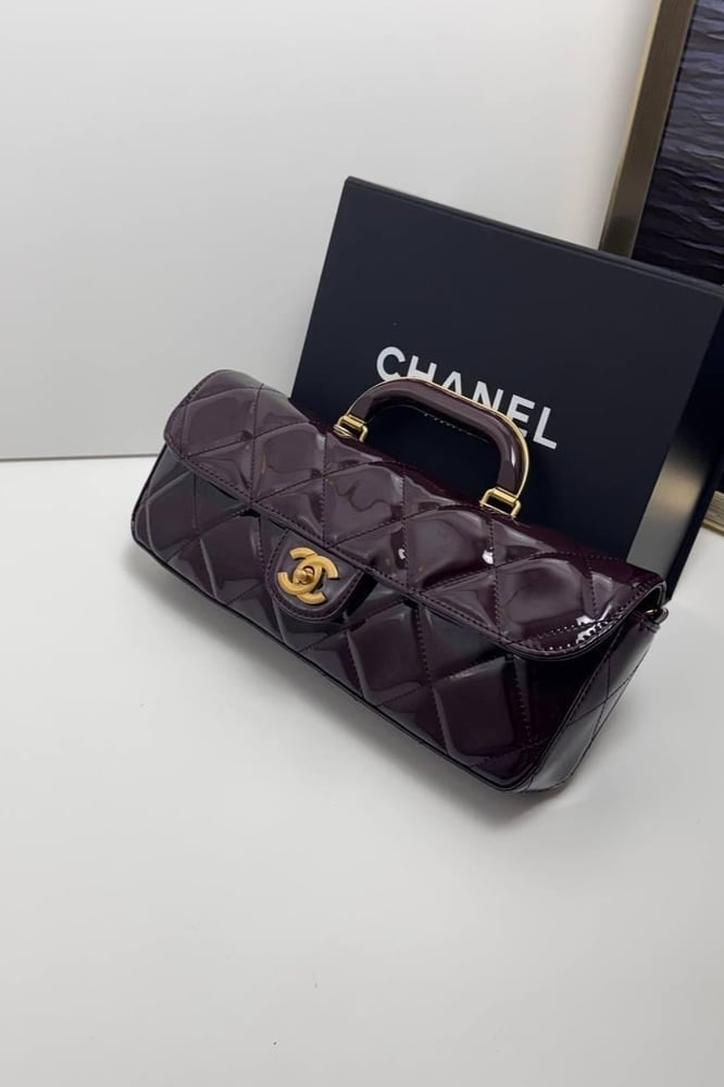 شنطة شانيل برقندي لمعه