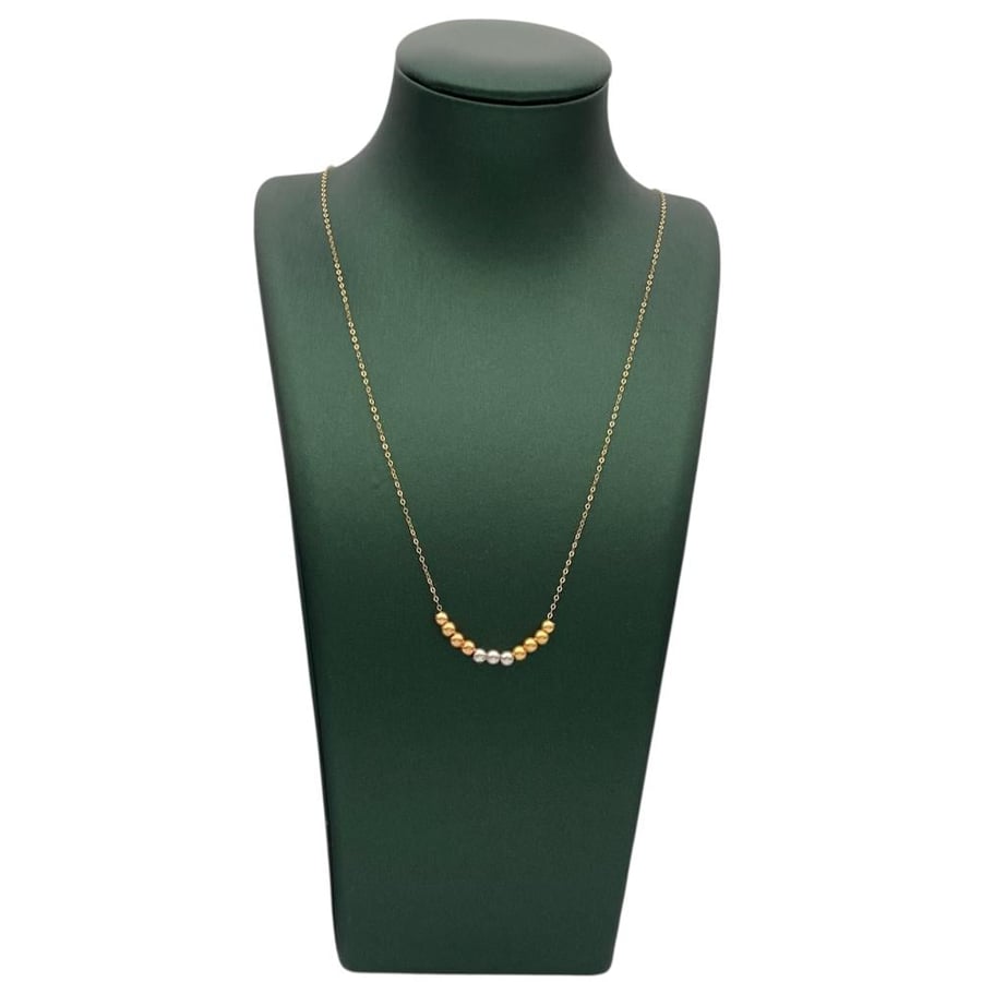 18 karat gold necklace, weight 0.60 grams