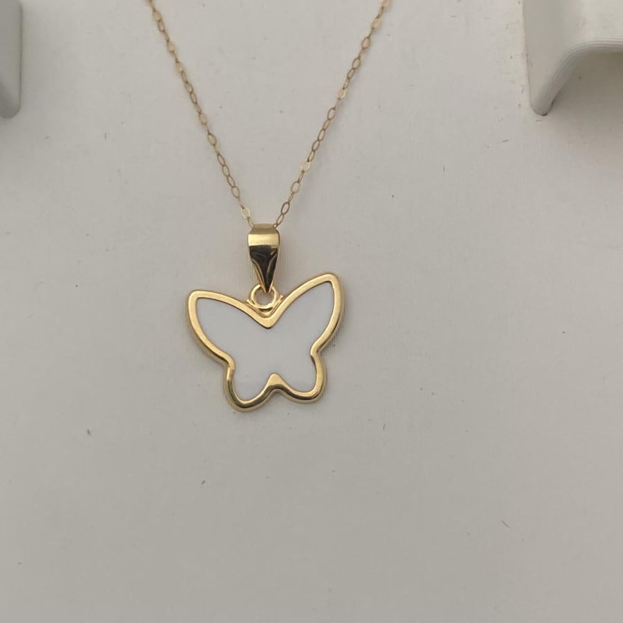 Half of a children's Spanish set, 18-karat gold, weight 0.57 grams
