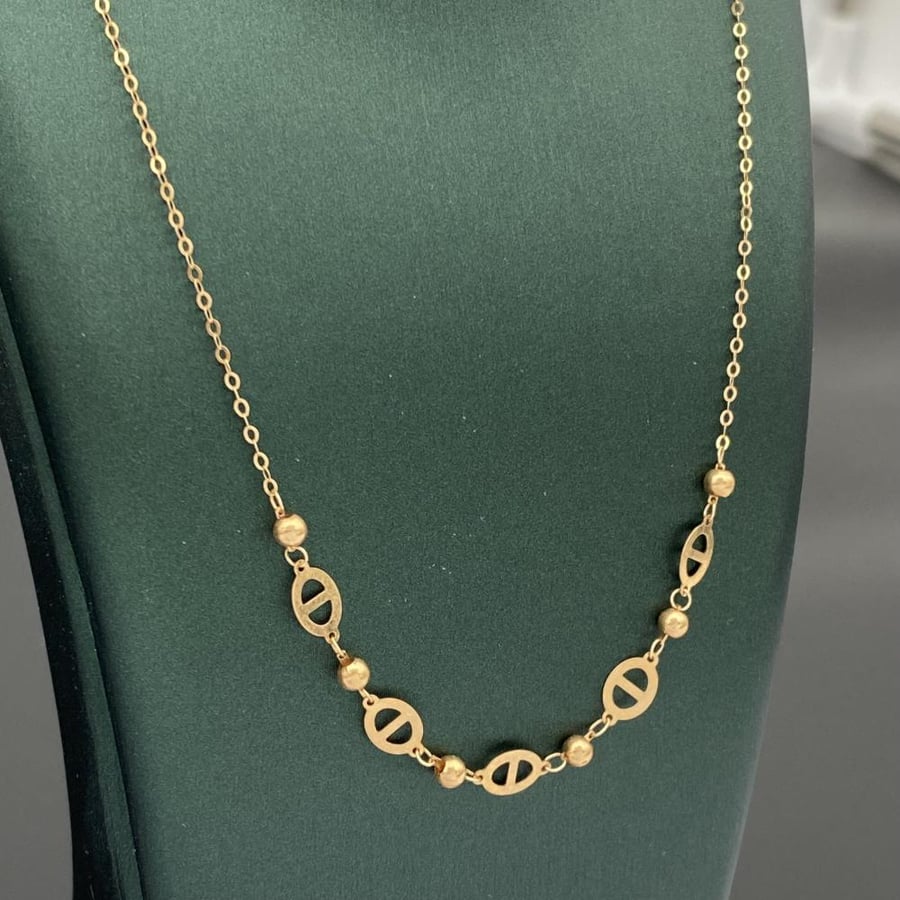 18 karat gold necklace, weight 1.10 grams
