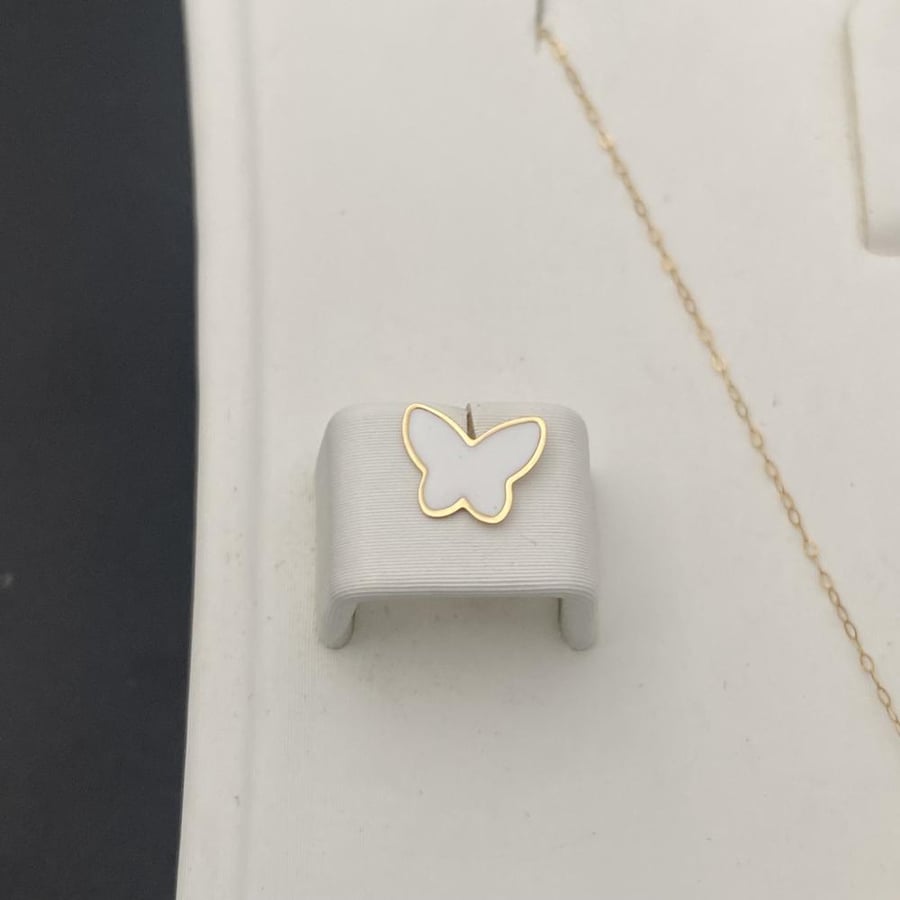 Half of a children's Spanish set, 18-karat gold, weight 0.57 grams