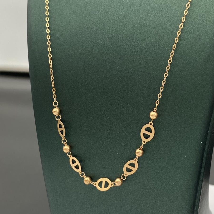 Gold necklace 18 karat weight 1.10 grams