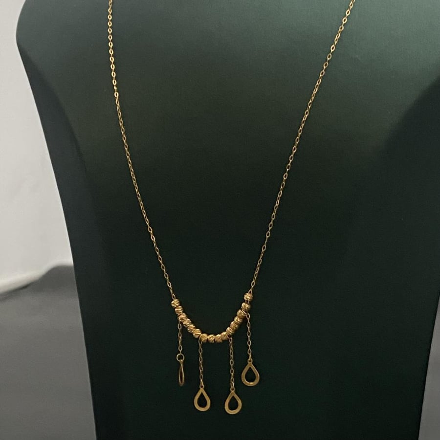Gold necklace 18 karat weight 1.2 grams