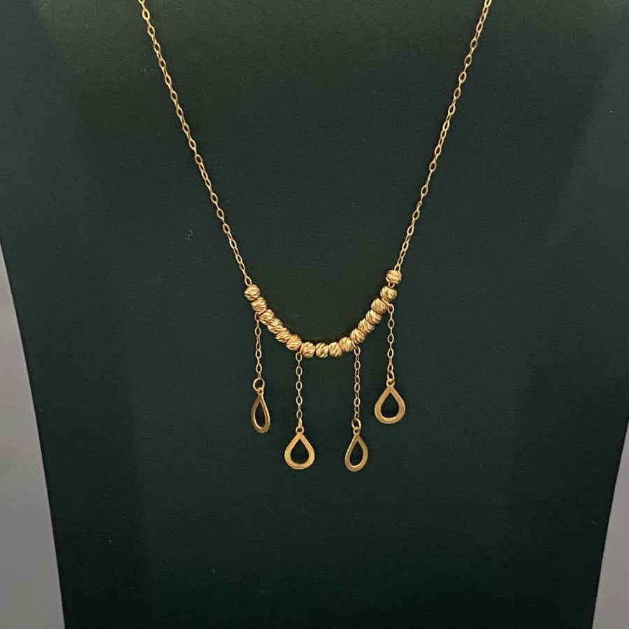 Gold necklace 18 karat weight 1.2 grams