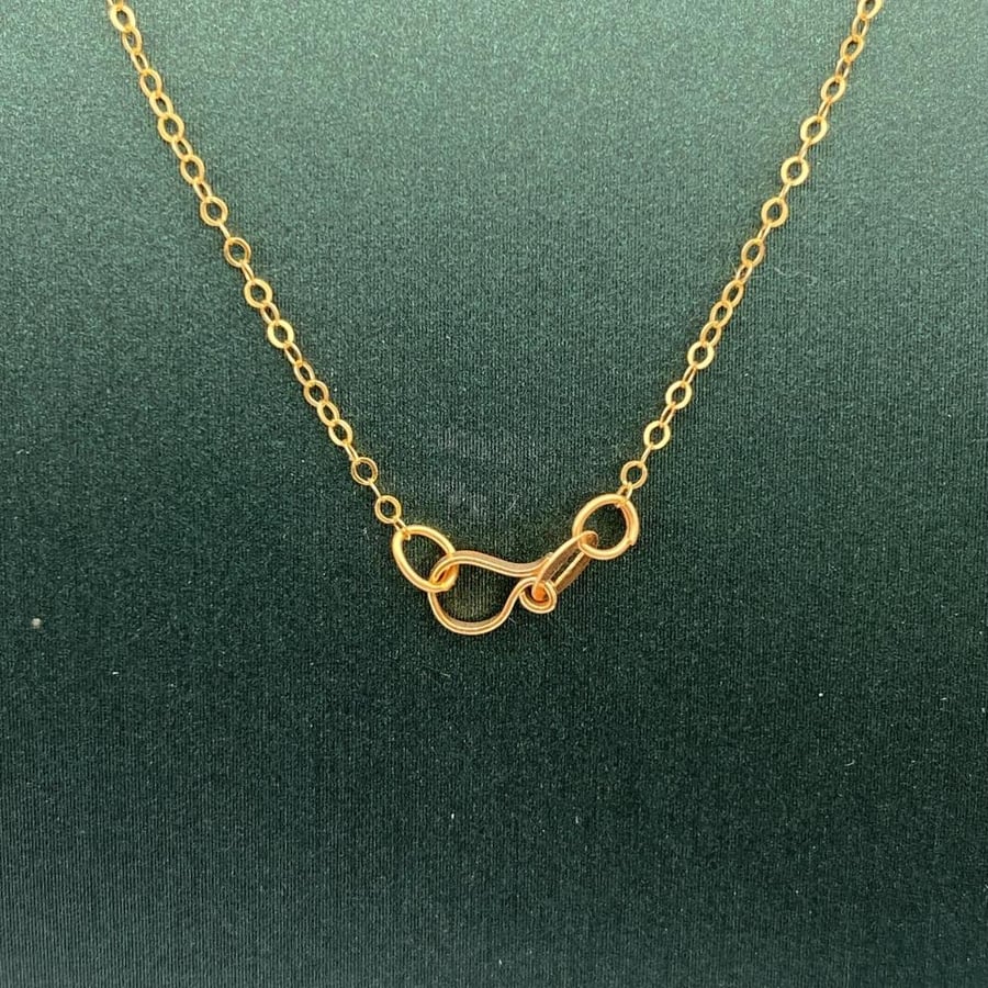 Gold necklace 21 karat weight 1.09 grams
