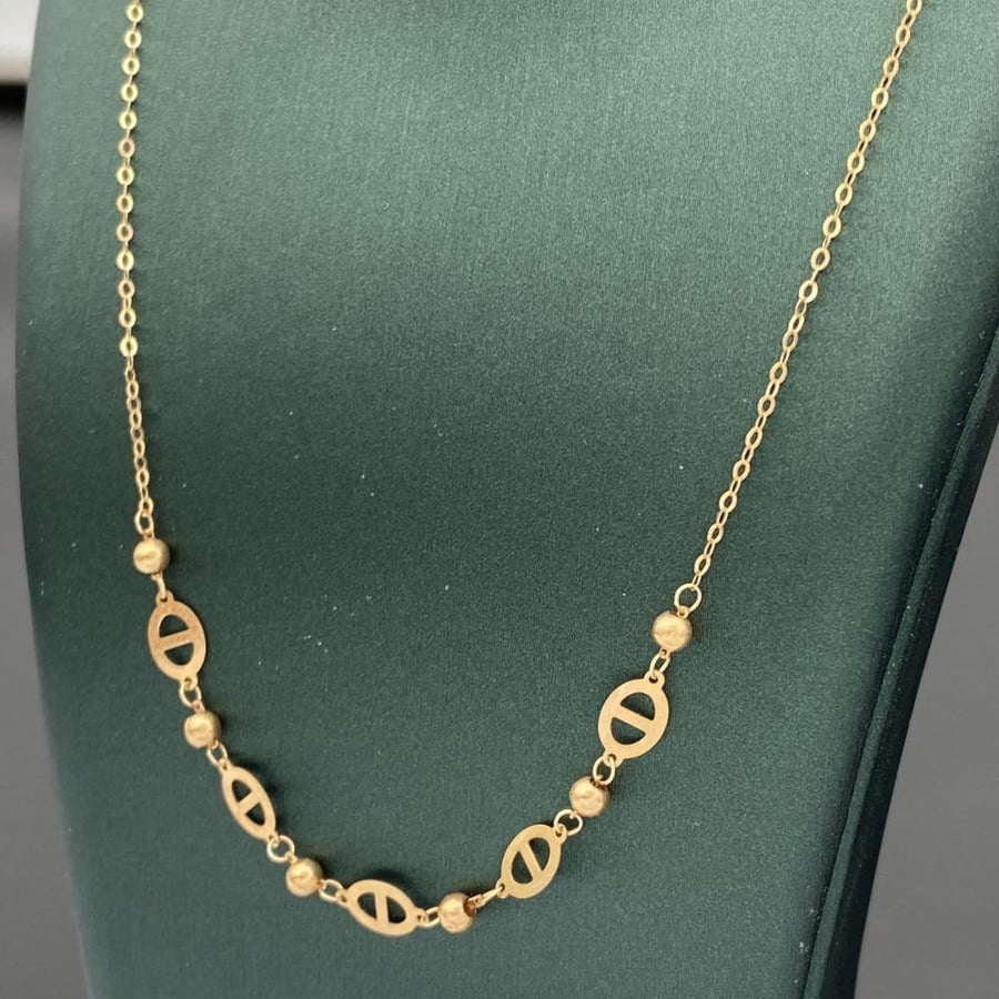 18 karat gold necklace, weight 1.10 grams