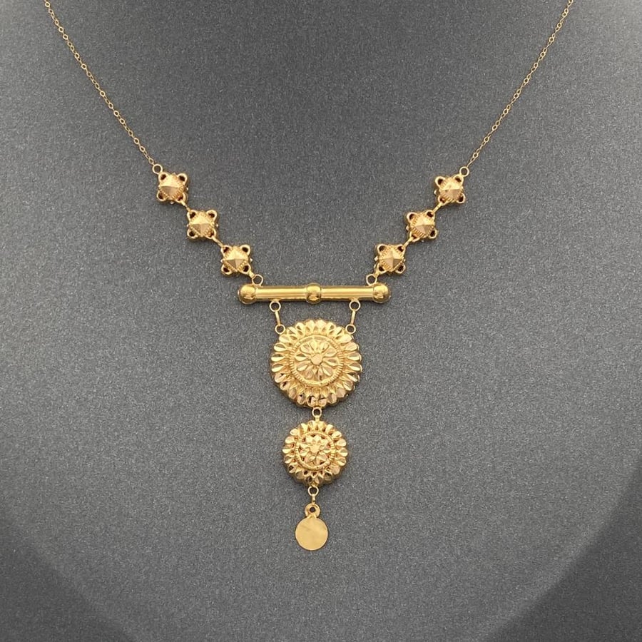 Gold set 21 karat weight 7 grams