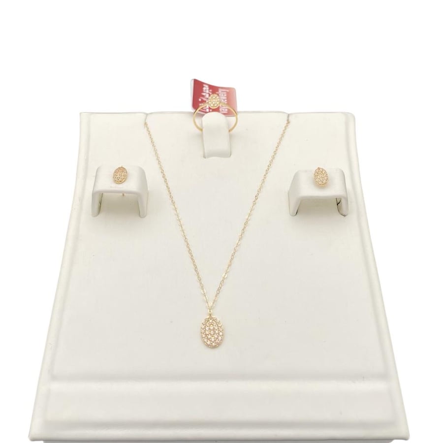 Half children's set of 18-karat gold weighing 1.26 grams