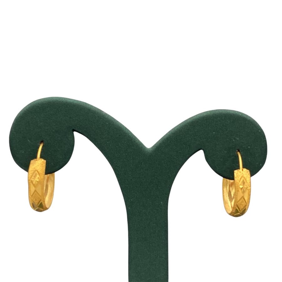 Gold earrings 21 karat weight 2.35 grams