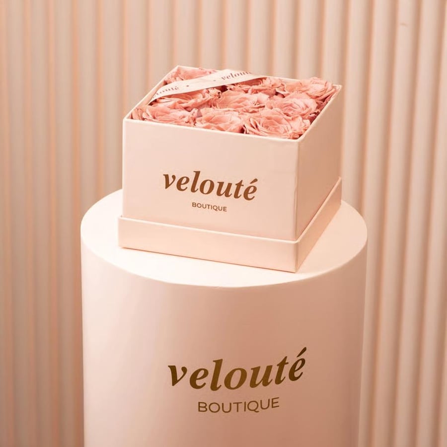 The pink square box