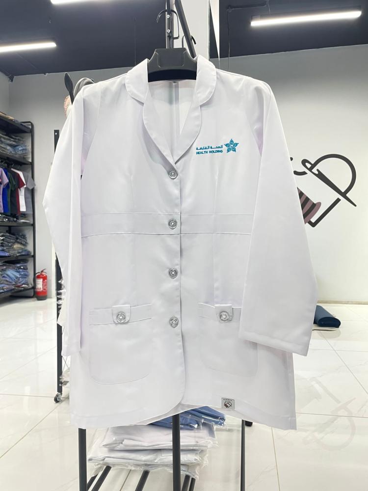 Embroidery of a logo upon request / Al-Sihha Holding Company logo / All health clusters