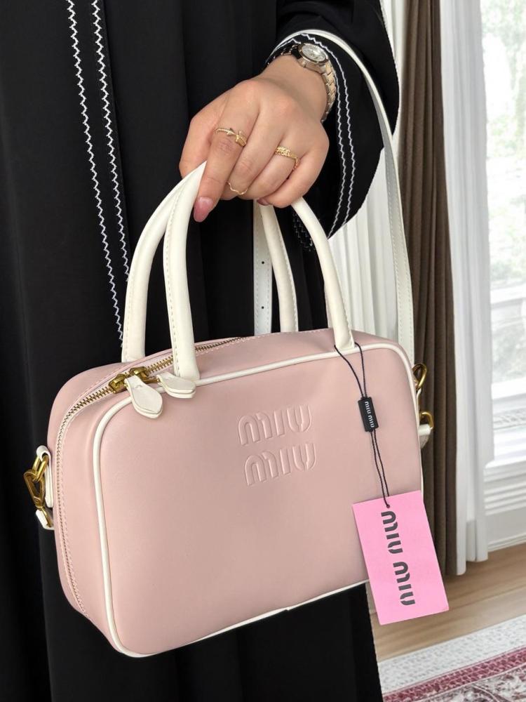 Miu Miu bag, this is high quality with accessories