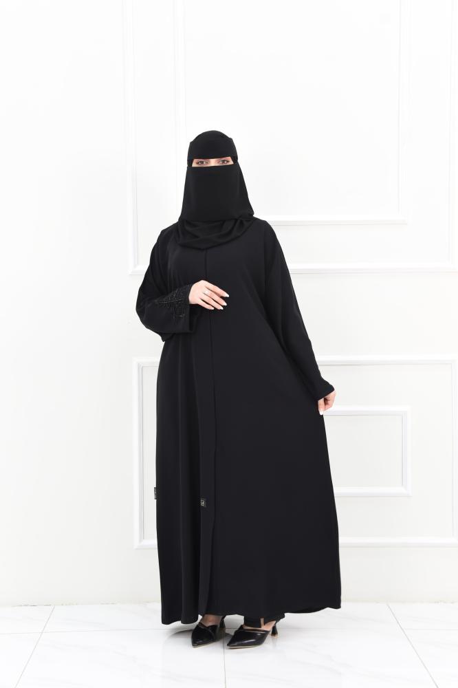Black abaya with black embroidery and a navy slit at the back