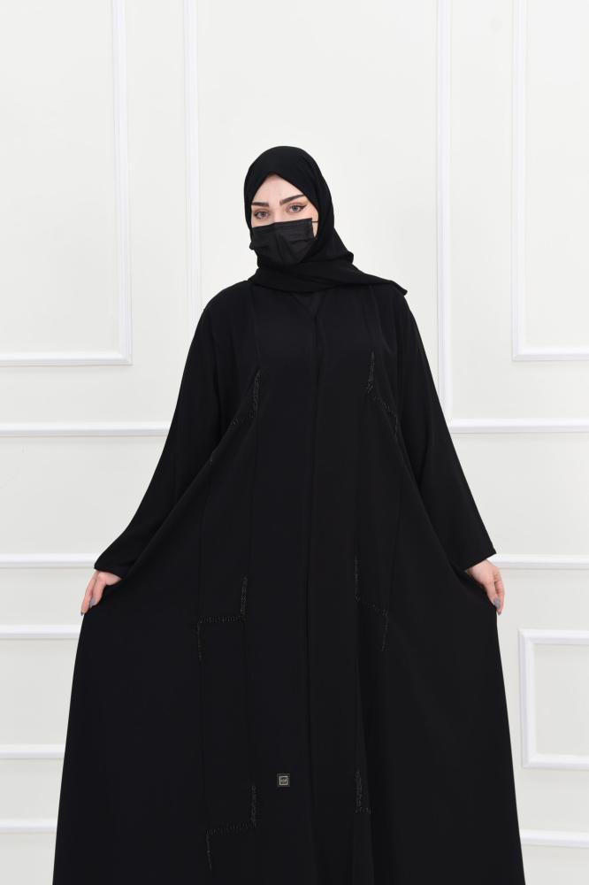 عباية كلوش تزينها تطريزات ساحرة