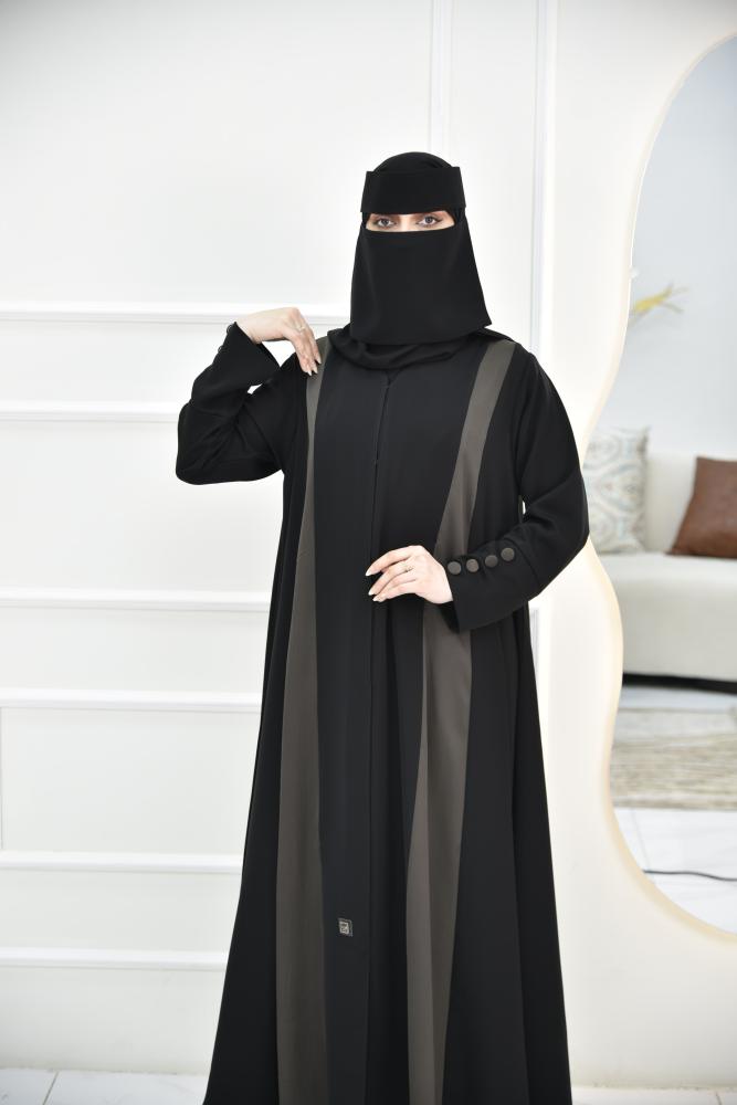 عباية كلوش حريرية بتفاصيل زيتيه ساحرة