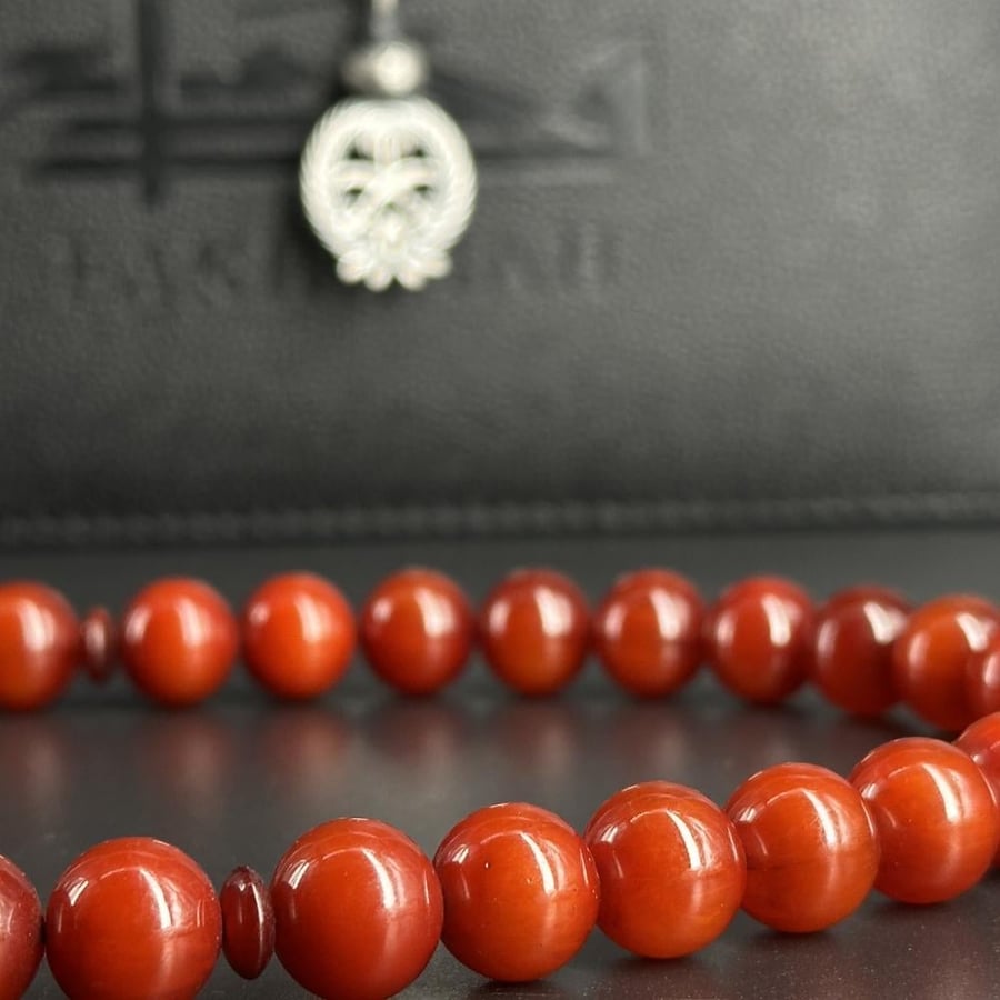 Misk honey rosary - Tarboozah with the Kingdom's emblem