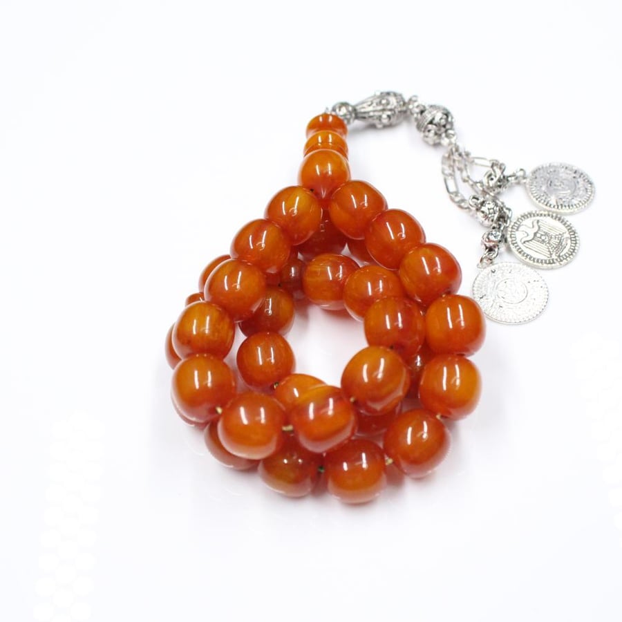 Musk honeyed rosary with wavy beads and antique tassel