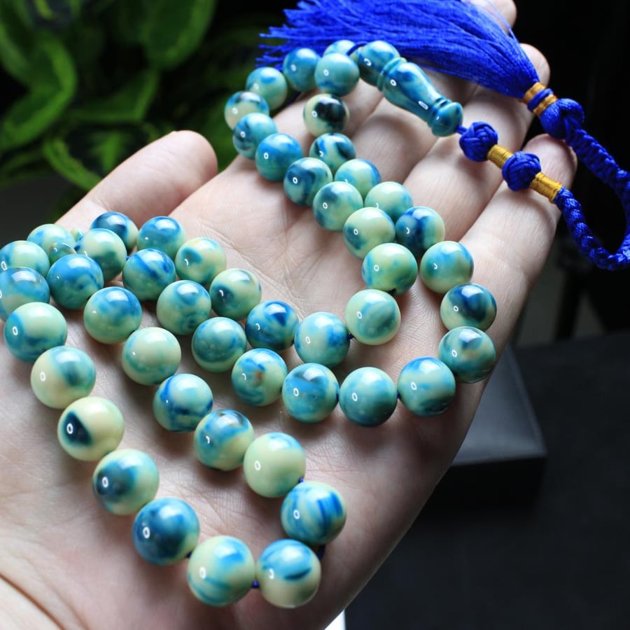Turquoise coralized agate prayer bead with marble pattern