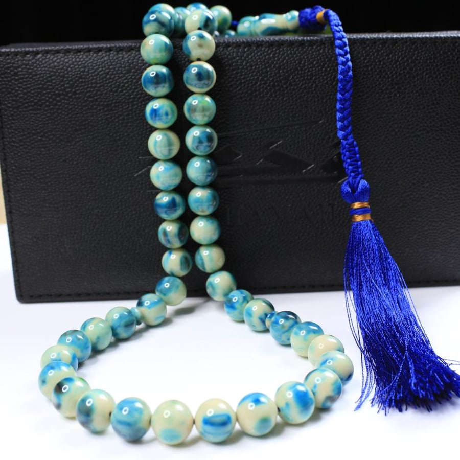 Turquoise coralized agate prayer bead with marble pattern
