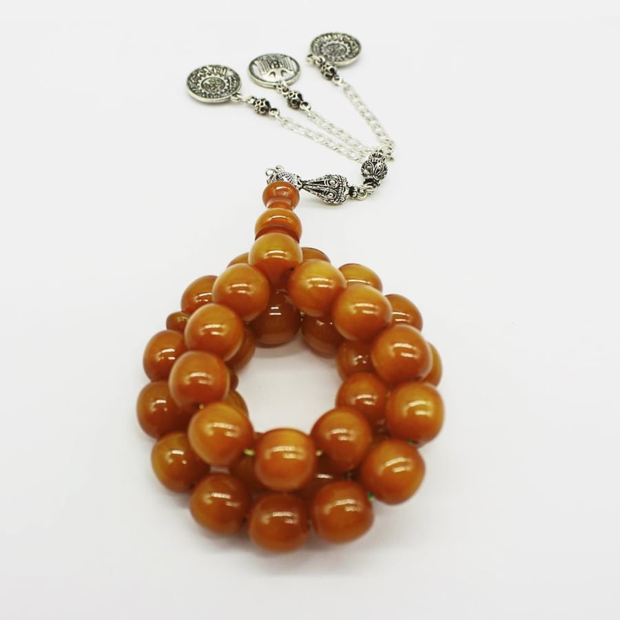 Musk honeyed rosary with wavy beads and antique tassel