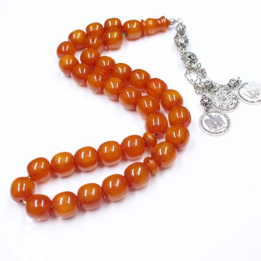 Musk honeyed rosary with wavy beads and antique tassel