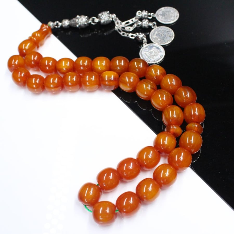 Musk honeyed rosary with wavy beads and antique tassel