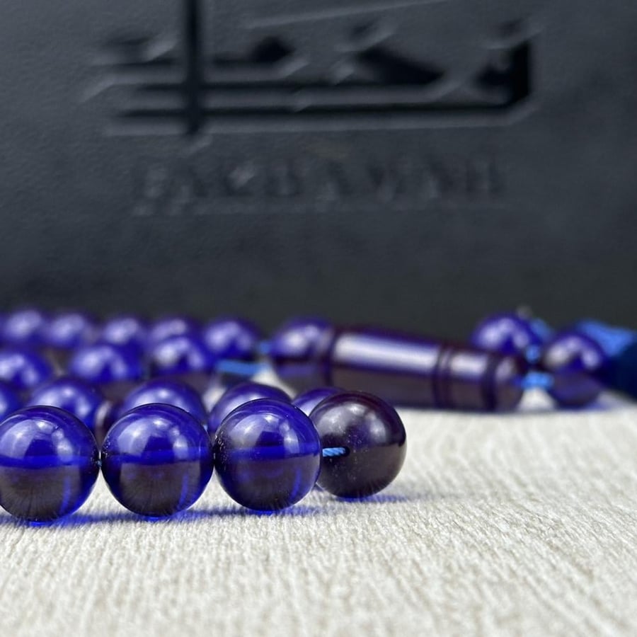 Dark blue saffron-colored prayer beads