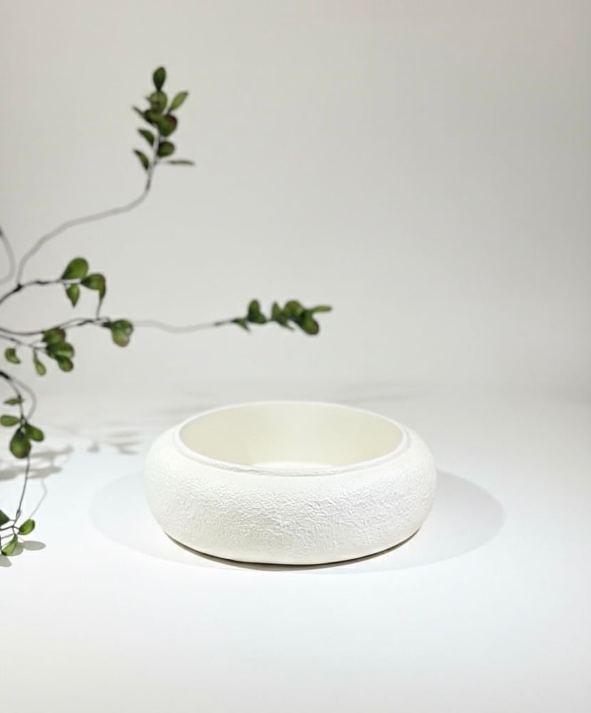 Round gypsum vase