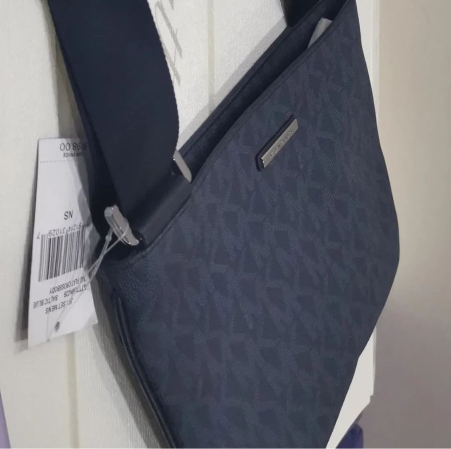 شنطة رجاليه ماركه michael kors