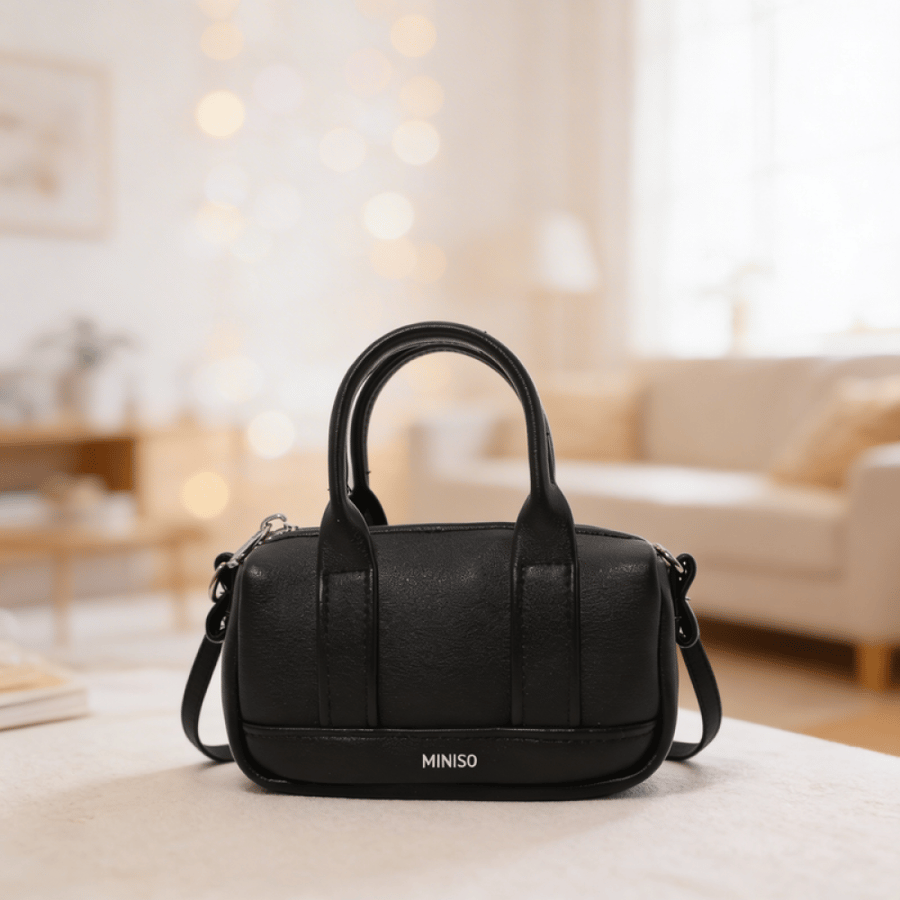 حقيبة عملات كروس بودي صغيرة بشكل وسادة أسود  MINISO